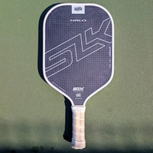 Selkirk SLK Halo Pro pickleball paddle, 14mm, gray, Max shape, on a pickleball court